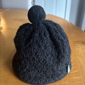 Black wool lined turtle fur knot beanie with Pom